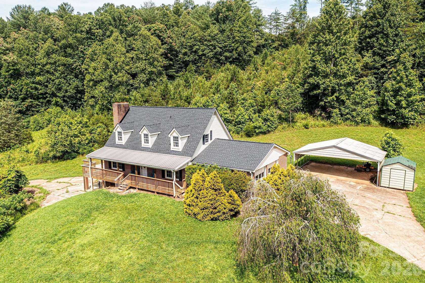 33.4 Acres of Land with Home for Sale in Boomer, North Carolina