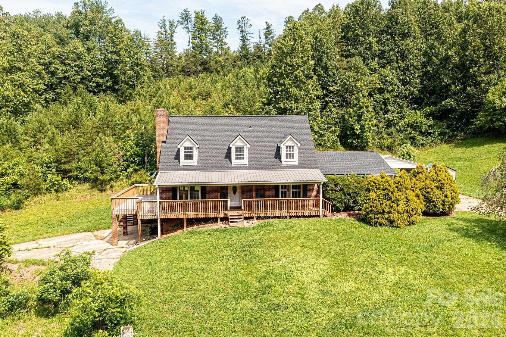 33.4 Acres of Land with Home for Sale in Boomer, North Carolina