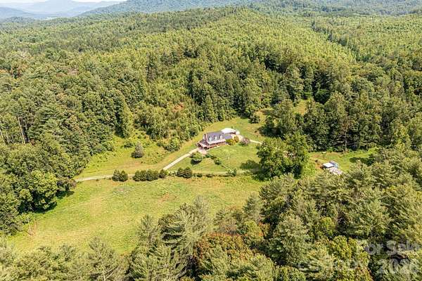 33.4 Acres of Land with Home for Sale in Boomer, North Carolina