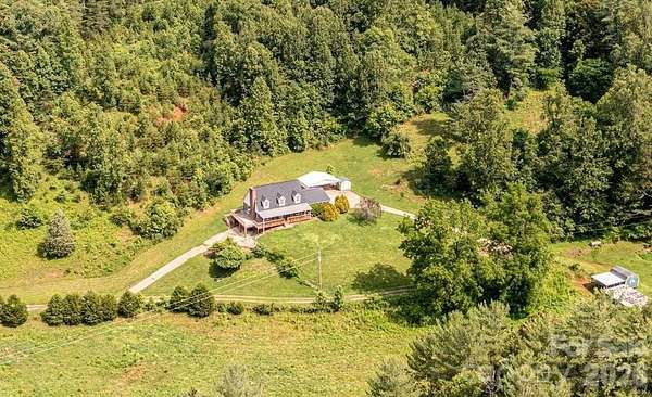 33.4 Acres of Land with Home for Sale in Boomer, North Carolina