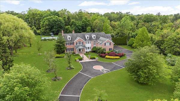 2.79 Acres of Residential Land with Home for Sale in Muttontown, New York