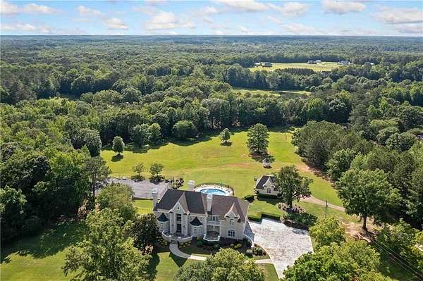 11.2 Acres of Land with Home for Sale in Brooks, Georgia