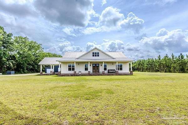 5 Acres of Residential Land with Home for Sale in Jay, Florida