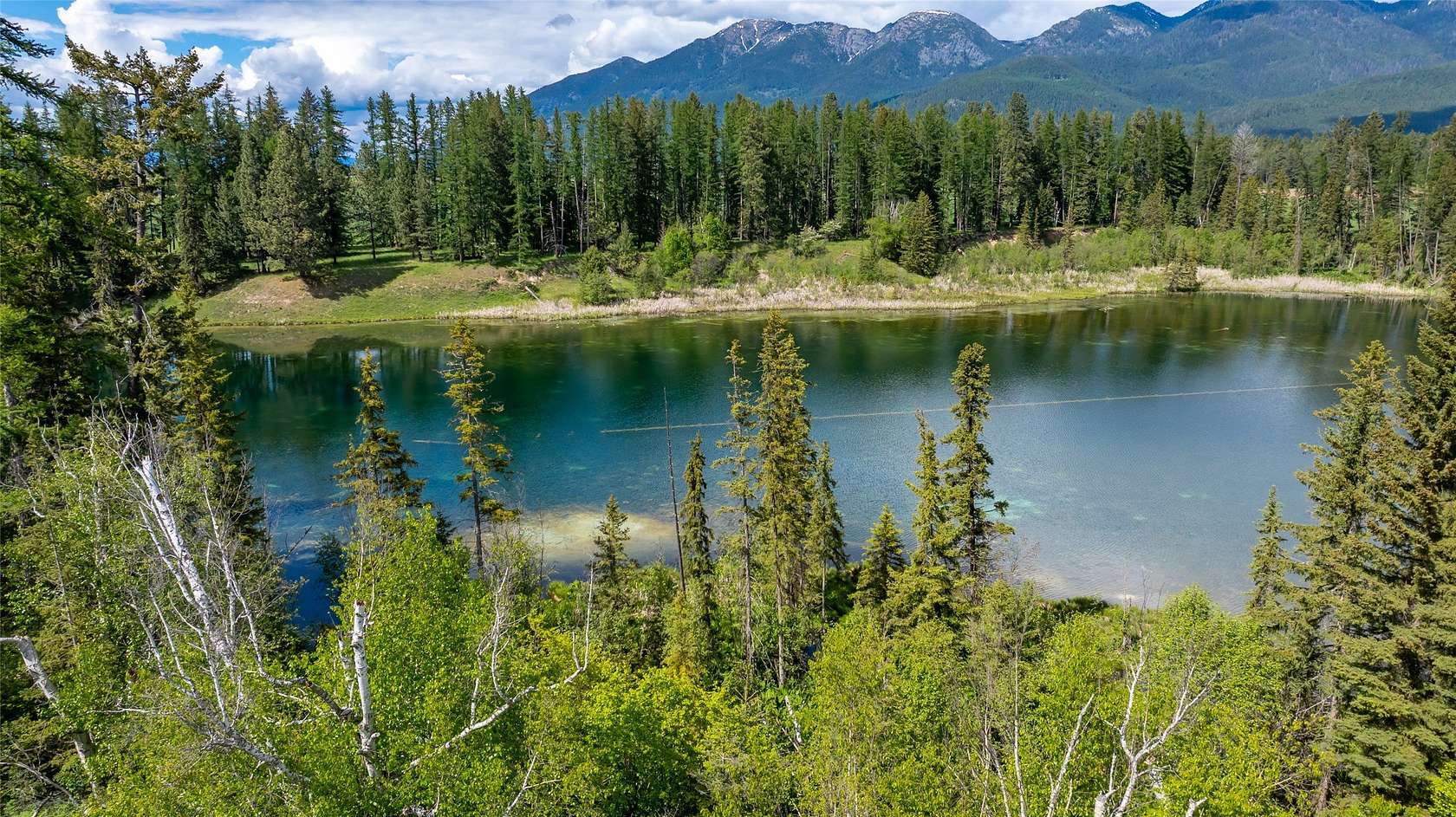 7 Acres of Residential Land with Home for Sale in Kalispell, Montana