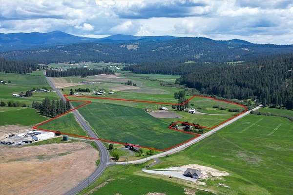 58.4 Acres of Agricultural Land with Home for Sale in Mead, Washington
