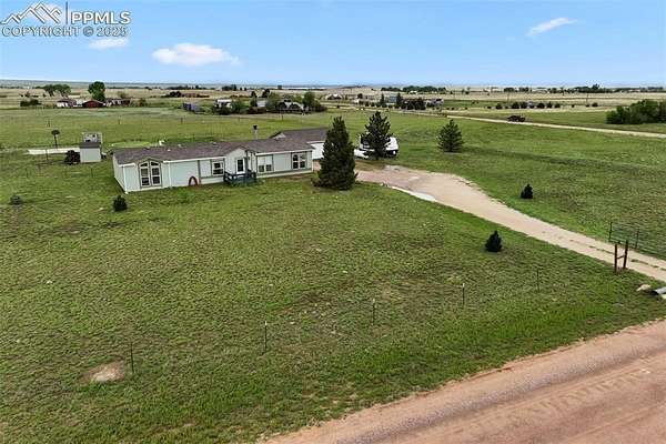 5 Acres of Residential Land with Home for Sale in Peyton, Colorado