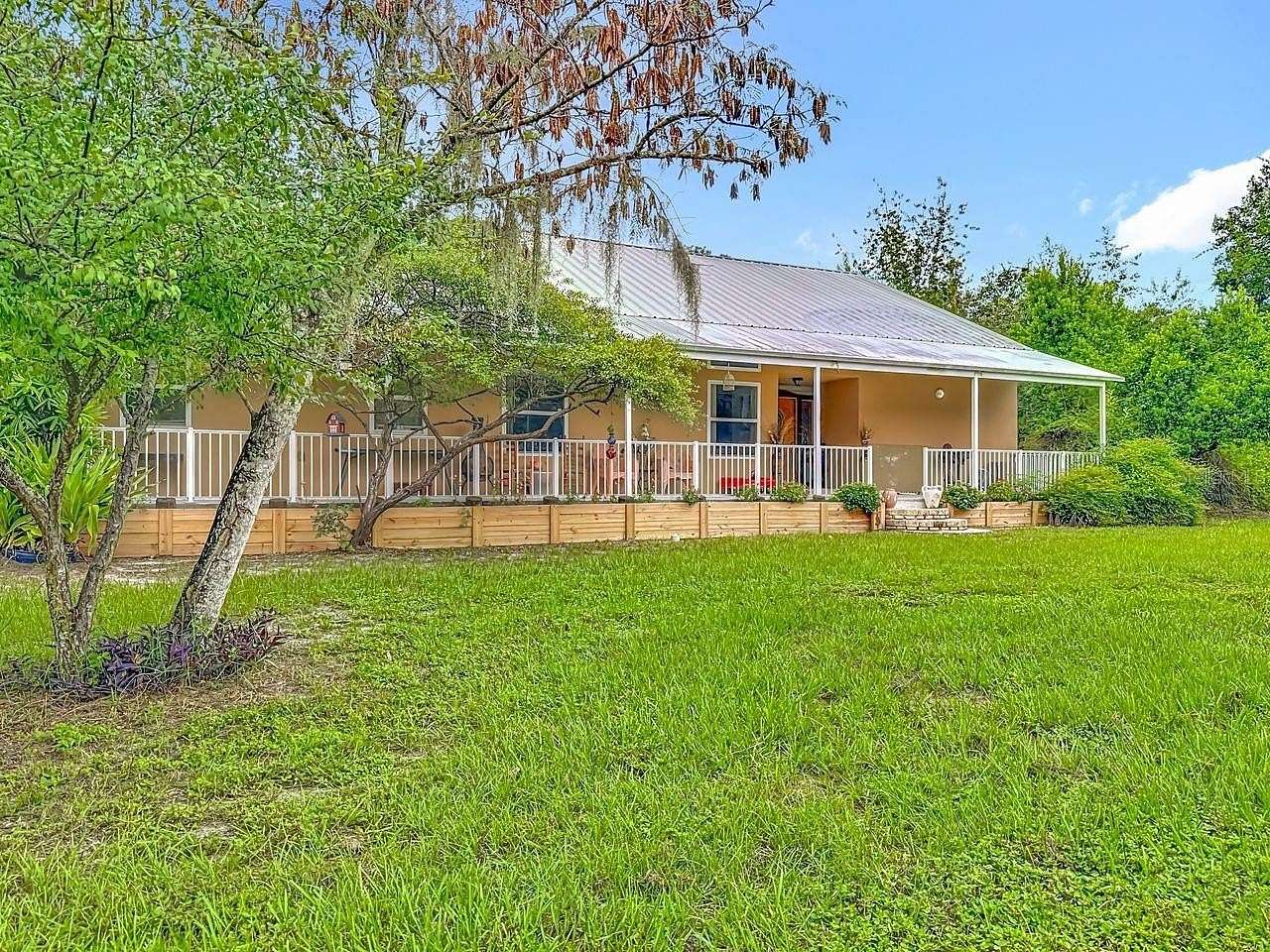 3.56 Acres of Residential Land with Home for Sale in Spring Hill, Florida