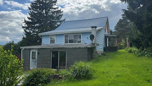15 Acres of Land with Home for Sale in Montrose, Pennsylvania