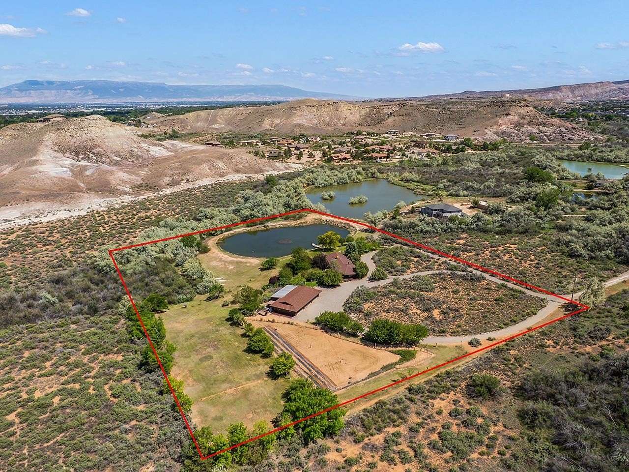 5.4 Acres of Residential Land with Home for Sale in Grand Junction, Colorado