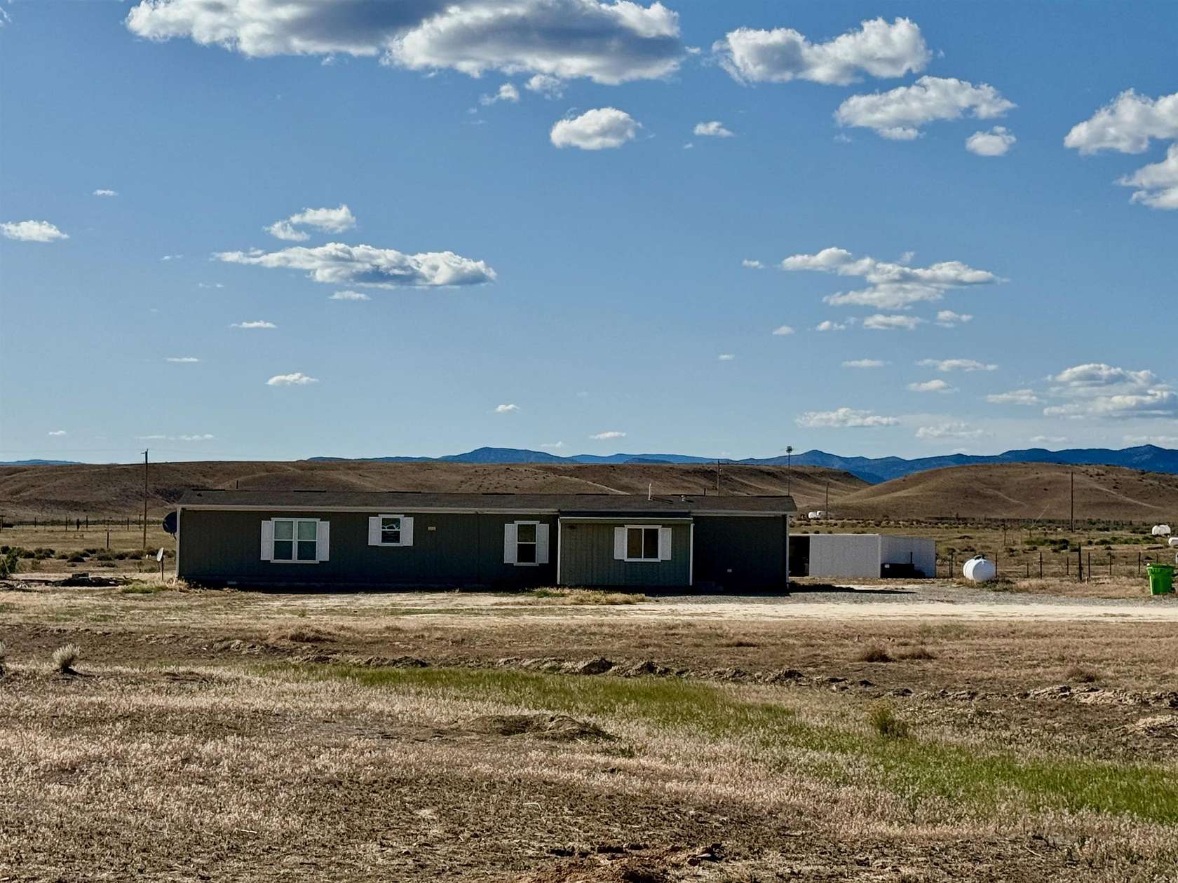 4.8 Acres of Residential Land with Home for Sale in Loma, Colorado
