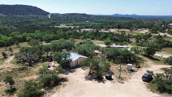 22.7 Acres of Recreational Land with Home for Sale in Center Point, Texas