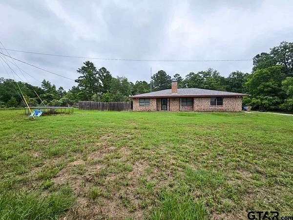 7.84 Acres of Land with Home for Sale in Palestine, Texas
