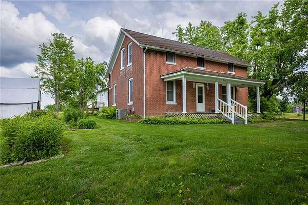 18.8 Acres of Land with Home for Sale in Shawneetown, Missouri
