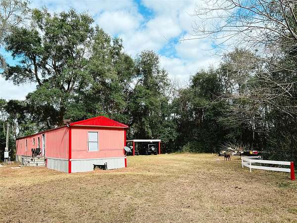 2.64 Acres of Residential Land with Home for Sale in Reddick, Florida