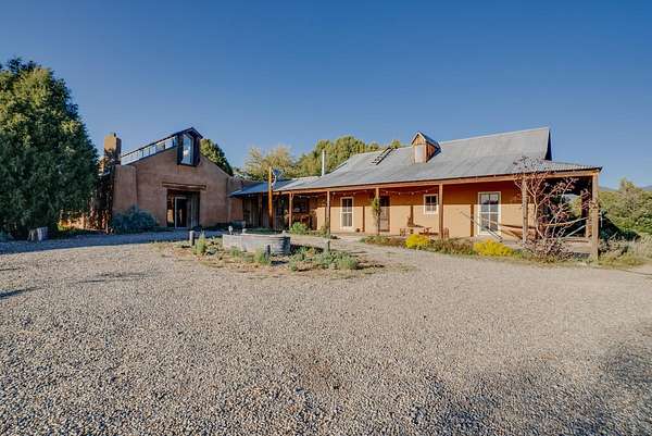 1.55 Acres of Residential Land with Home for Sale in Arroyo Seco, New Mexico