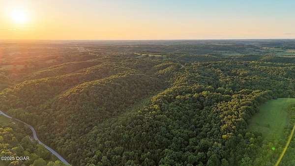 240 Acres of Land with Home for Sale in Crane, Missouri