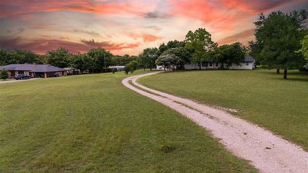 4 Acres of Land with Home for Sale in Oak Leaf, Texas