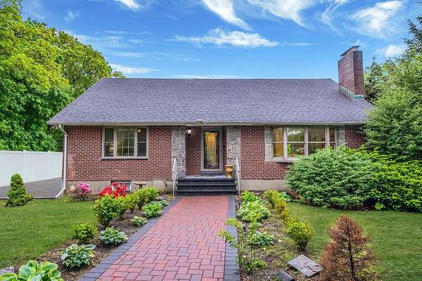 1.5 Acres of Residential Land with Home for Sale in Greenlawn, New York