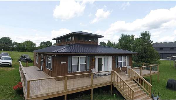 2.2 Acres of Residential Land with Home for Sale in Mammoth Spring, Arkansas