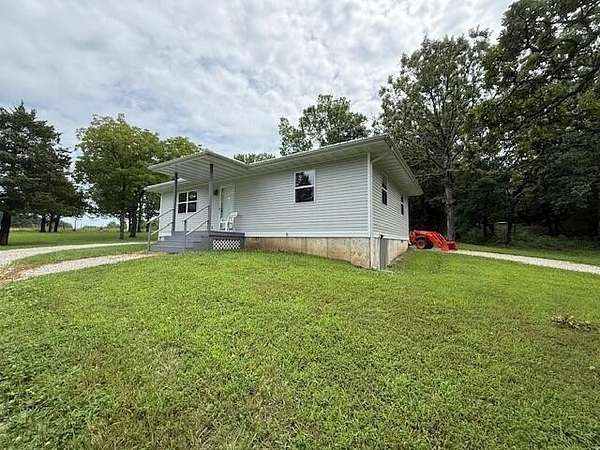 5 Acres of Residential Land with Home for Sale in Flemington, Missouri