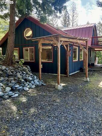 6.12 Acres of Residential Land with Home for Sale in Agness, Oregon