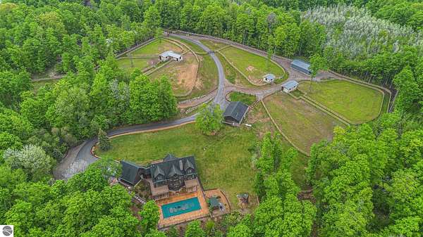 9.54 Acres of Land with Home for Sale in Williamsburg, Michigan