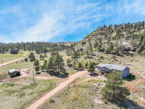 11.8 Acres of Land with Home for Sale in Florissant, Colorado