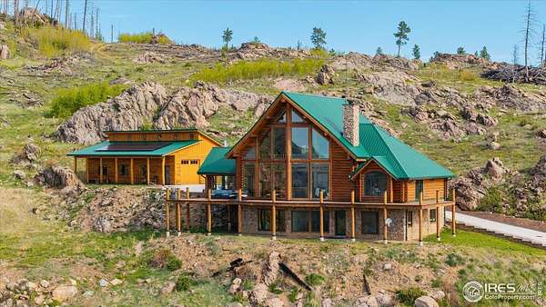 40 Acres of Recreational Land with Home for Sale in Bellvue, Colorado