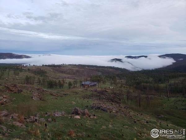 40 Acres of Recreational Land with Home for Sale in Bellvue, Colorado