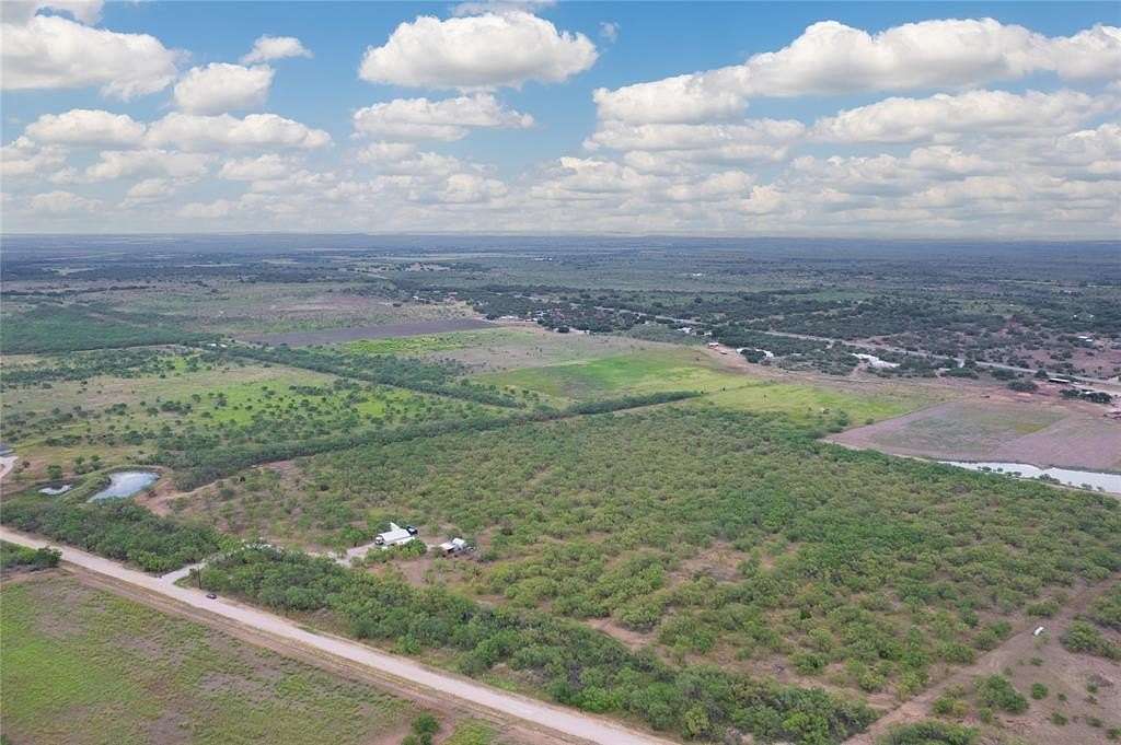 26.2 Acres of Land with Home for Sale in Brookesmith, Texas