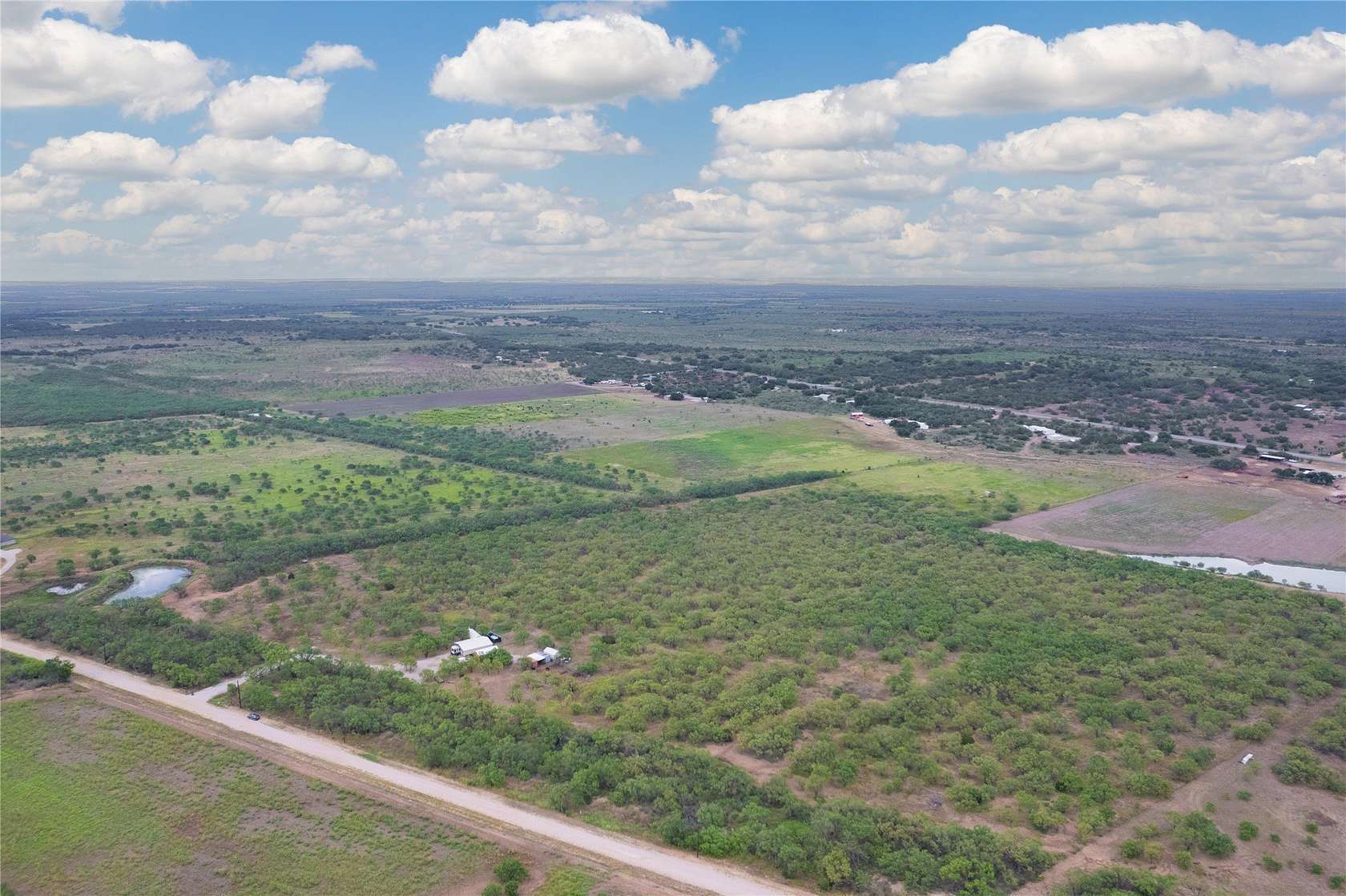 26.2 Acres of Recreational Land with Home for Sale in Brookesmith, Texas