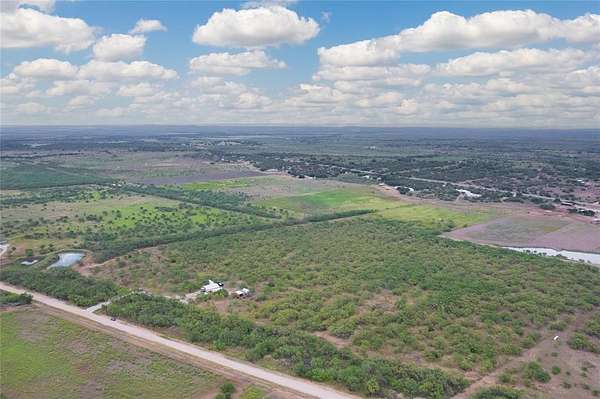 26.2 Acres of Land with Home for Sale in Brookesmith, Texas