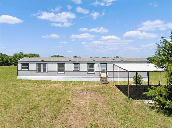 0.56 Acres of Residential Land with Home for Sale in Burneyville, Oklahoma