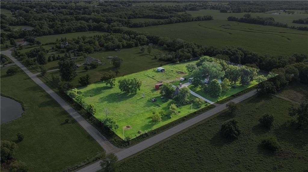 5 Acres of Land with Home for Sale in Peculiar, Missouri