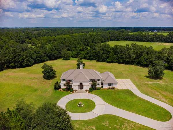 23 Acres of Land with Home for Sale in Molino, Florida