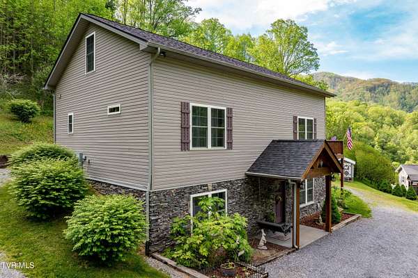 3.3 Acres of Residential Land with Home for Sale in Flag Pond, Tennessee