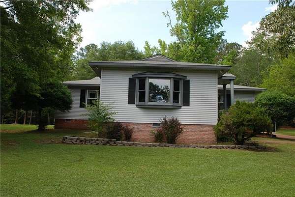 7.14 Acres of Residential Land with Home for Sale in Opelika, Alabama