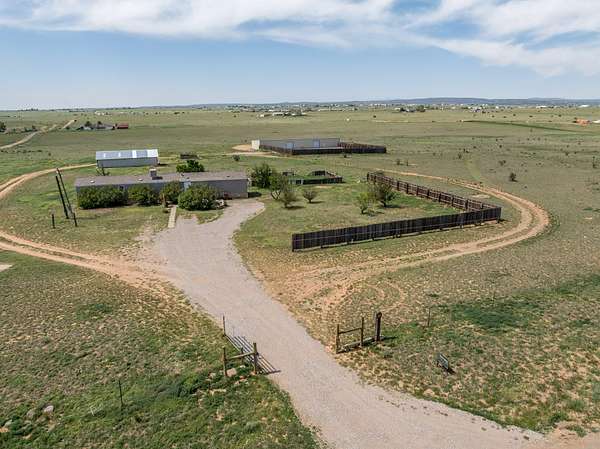 20.3 Acres of Agricultural Land with Home for Sale in Edgewood, New Mexico
