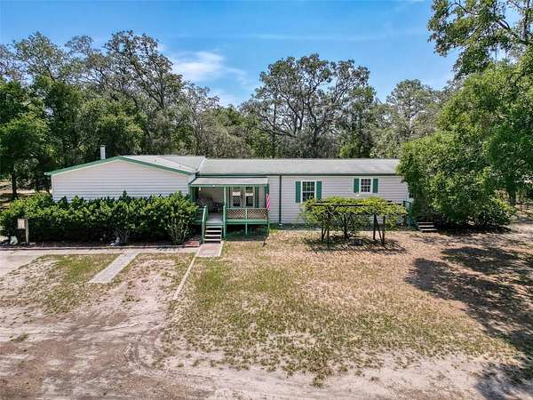 1.6 Acres of Residential Land with Home for Sale in Brooksville, Florida