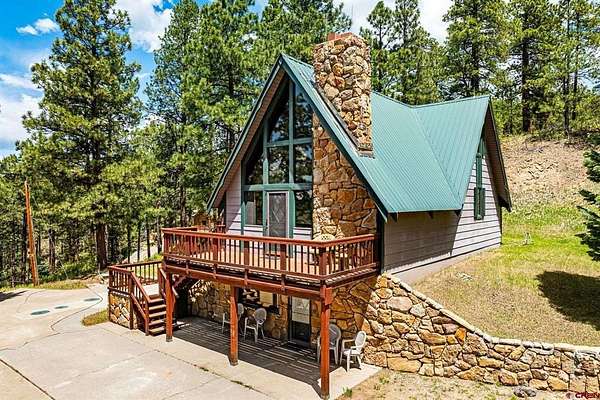 5.8 Acres of Residential Land with Home for Sale in Bayfield, Colorado