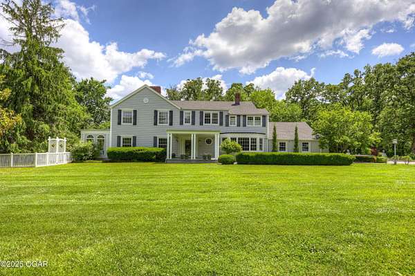 9 Acres of Land with Home for Sale in Webb City, Missouri