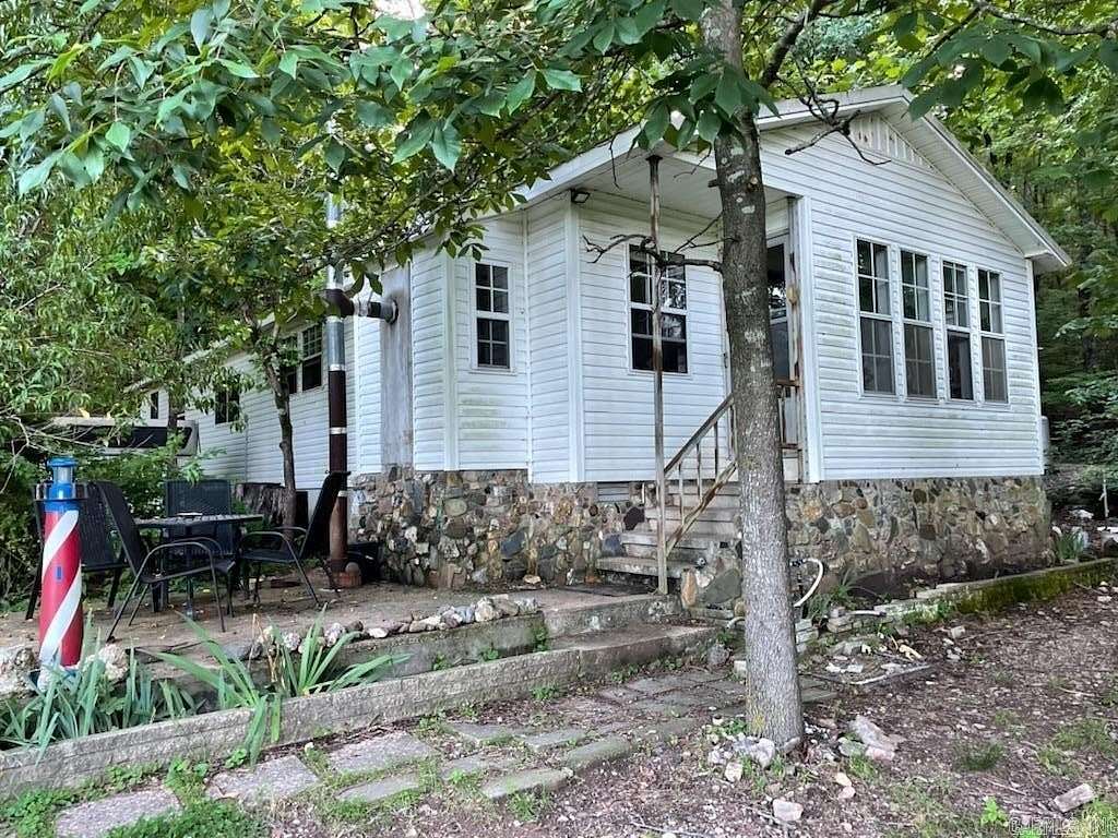 61 Acres of Land with Home for Sale in Mena, Arkansas