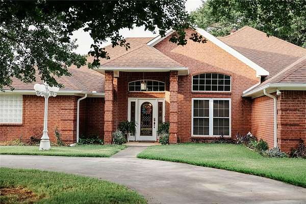 14.4 Acres of Land with Home for Sale in Bonham, Texas