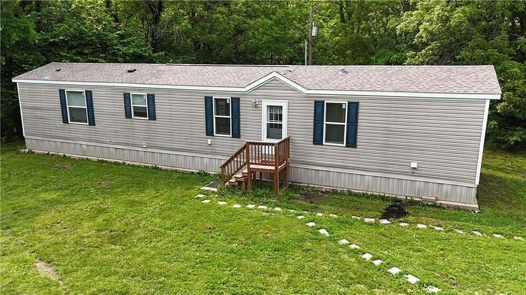 7 Acres of Land with Home for Sale in Savannah, Missouri