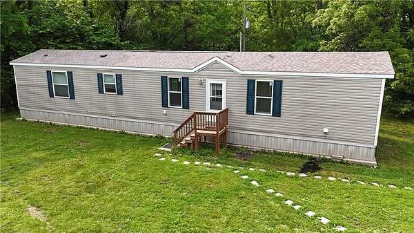 7 Acres of Land with Home for Sale in Savannah, Missouri