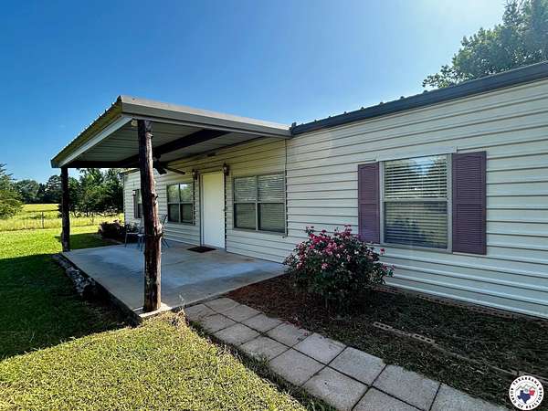 30 Acres of Land with Home for Sale in Hooks, Texas