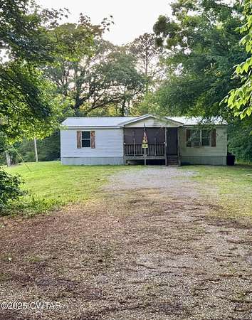 3 Acres of Residential Land with Home for Sale in Henderson, Tennessee