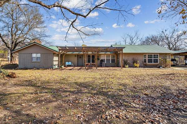 8.5 Acres of Residential Land with Home for Sale in Chouteau, Oklahoma
