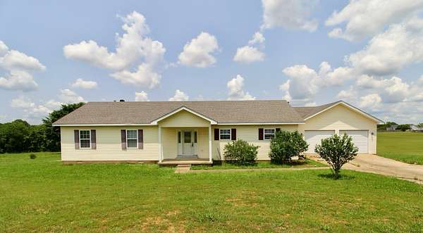 2.63 Acres of Residential Land with Home for Sale in Lexington, Tennessee