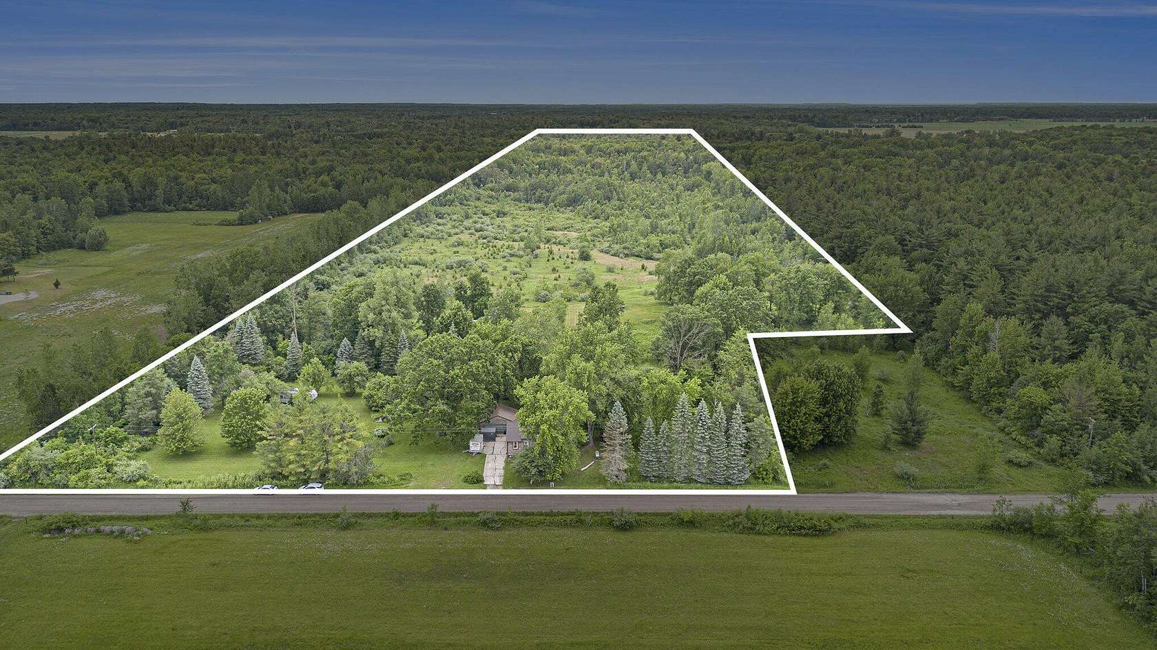 38 Acres of Recreational Land with Home for Sale in Rhodes, Michigan